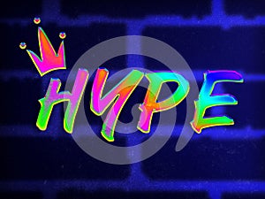 Bright rainbow word Hype with crown illustration against brick wall