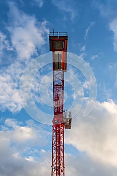 Bright Red Construction Crane Metal Frame Blue Sky Below Perspective Industry Equipment