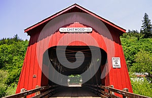 Bright red covered bridge