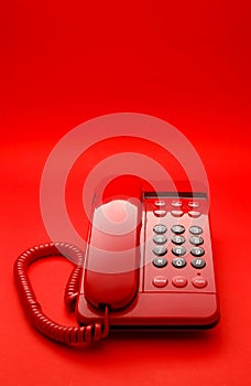 Bright red desktop telephone