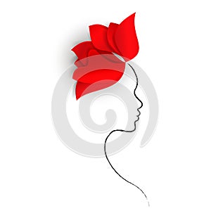 Bright red flower and a silhouette of a woman`s face isolated on a white background