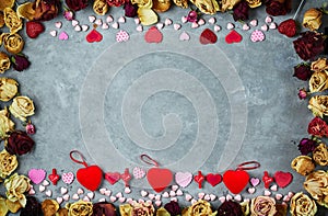 Bright red hearts on the gray concrete background