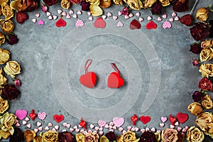 Bright red hearts on the gray concrete background