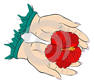 Red flower in the hands of a woman