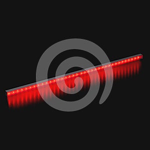 Bright red LED flood light bar on black background