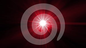 Bright red light with flickering rays appearing and dissappearing while moving by curved trajectory and spinning on