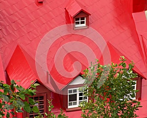 Bright red roof with gables photo
