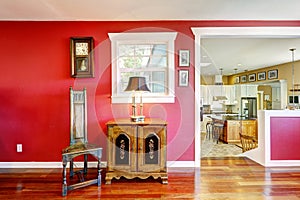 Bright red room with antique furniture