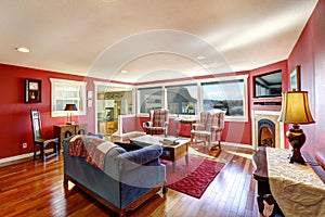 Bright red room with antique furniture