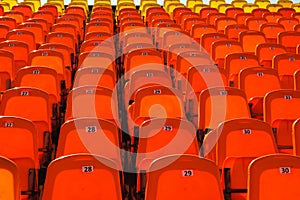Bright red rows of seats in the stadium