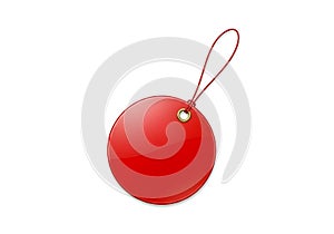 A bright red spherical object with a small attached string loop