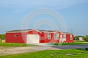 Bright Red Sunlit Manufactured Home