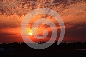 Bright red sunset and cloudscape