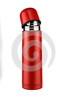 Bright red thermos parted photo
