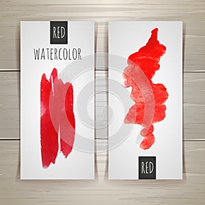 Bright red watercolor brush strokes.