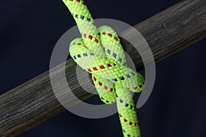 Bright rope tied around wood