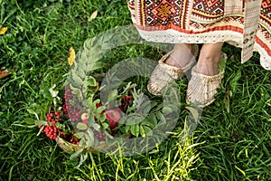 Bright Russian bast shoes with a Russian-folk sundress