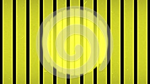 Bright scratched yellow background with vertical black stripes and illuminated circle spotlight