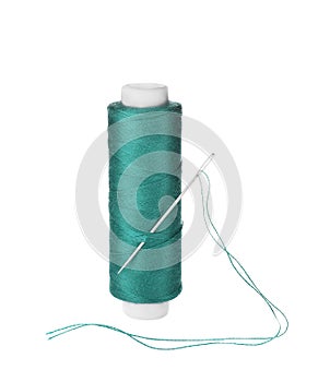 Bright sewing thread with needle isolated on white