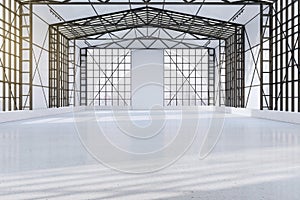 Bright spacious concrete empty hangar interior with city view and window frames. Factory and industrial concept.