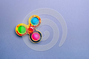 Bright spinner and simple dimple. Fashionable and modern antistress toy for children and adults.