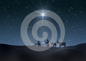 Bright Star of Bethlehem, or Christmas Star. Silhouettes of Jesus Christ, Mary, Joseph and animals