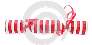 Bright striped Christmas cracker isolated on white, top view