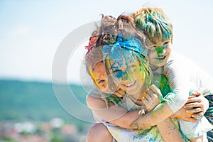 Bright summer colors. Happy kids smiling laughing and hugging outdoors. Cute childre having fun outside.