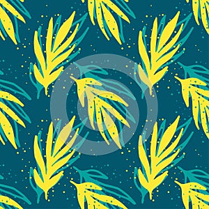 Bright summer seamless pattern of painted yellow branches with splashes of paint on a green-blue background