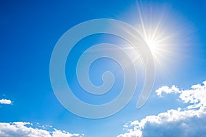 Bright sun on blue sky