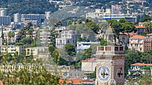 Bright sun lights red roofs of the old city timelapse. Aerial view from Shatto`s hill. Nice, France