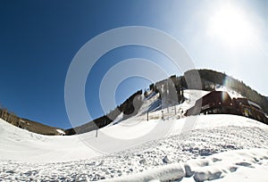 Bright sun in winter mountains
