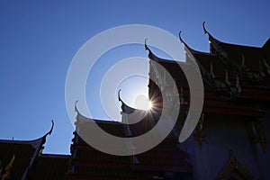 Bright Sunbeam Shining Through the Gable Roofs of Wat Benchamabophit in Bangkok, Thailand