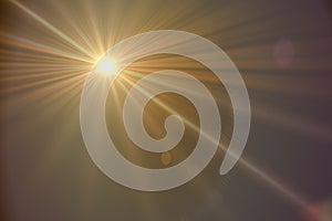 Bright sunlight flare with warm yellow rays and lens reflection overlay for photo editing summer design or dreamy atmospheric photo