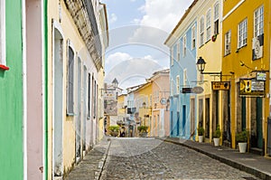 Bright sunny view of the historic tourist center of Pelourinho, Salvador da Bahia, Brazil featuring colorful colonial architecture