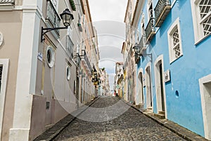 Bright sunny view of the historic tourist center of Pelourinho, Salvador da Bahia, Brazil featuring colorful colonial architecture