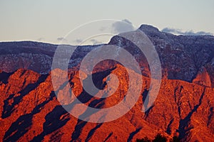 Bright sunset color on the Sandia Mountains of New Mexico photo