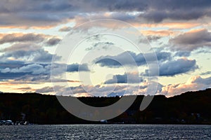 Bright sunset over Penetanguishene with silhouetted shoreline