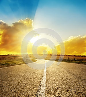 Bright sunset over road