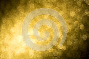 Bright unfocused gold abstract bokeh background