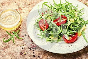 Bright vegetable salad with sun-dried tomato and herbs
