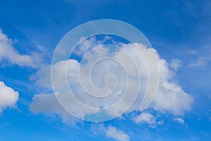 Bright white cloud on a blue sky. Background