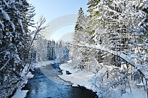 Bright snowy riverscape photo