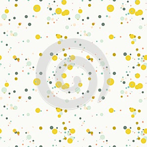 Bright yellow, blue, green, orange messy dots on white background. Festive seamless pattern with round shapes.