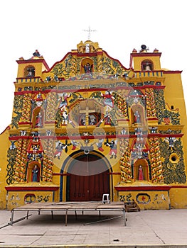 Bright Yellow Church in San Andres Xecul, Guatemala photo