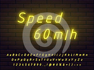 Bright yellow neon font set technical style with transparent glow on a brick background