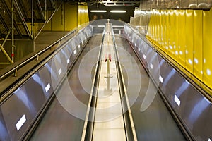 Bright Yellow Subway Metal Escalator Long Tall Architecture Interior Underground City Urban Diagonal Perpsective