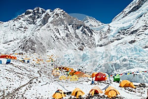 Bright yellow tents in Mount Everest Base Camp, Khumbu glacier and mountains, Nepal, Himalayas