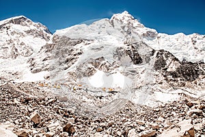 Bright yellow tents in Mount Everest Base Camp, Khumbu glacier and mountains, Nepal, Himalayas