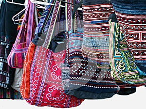 Brightly Colored Boho Bags or Purses in a Market Stall